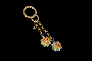 Shop online for fashion accessories from Divus India. Bag charms made with Swarovski crystals 